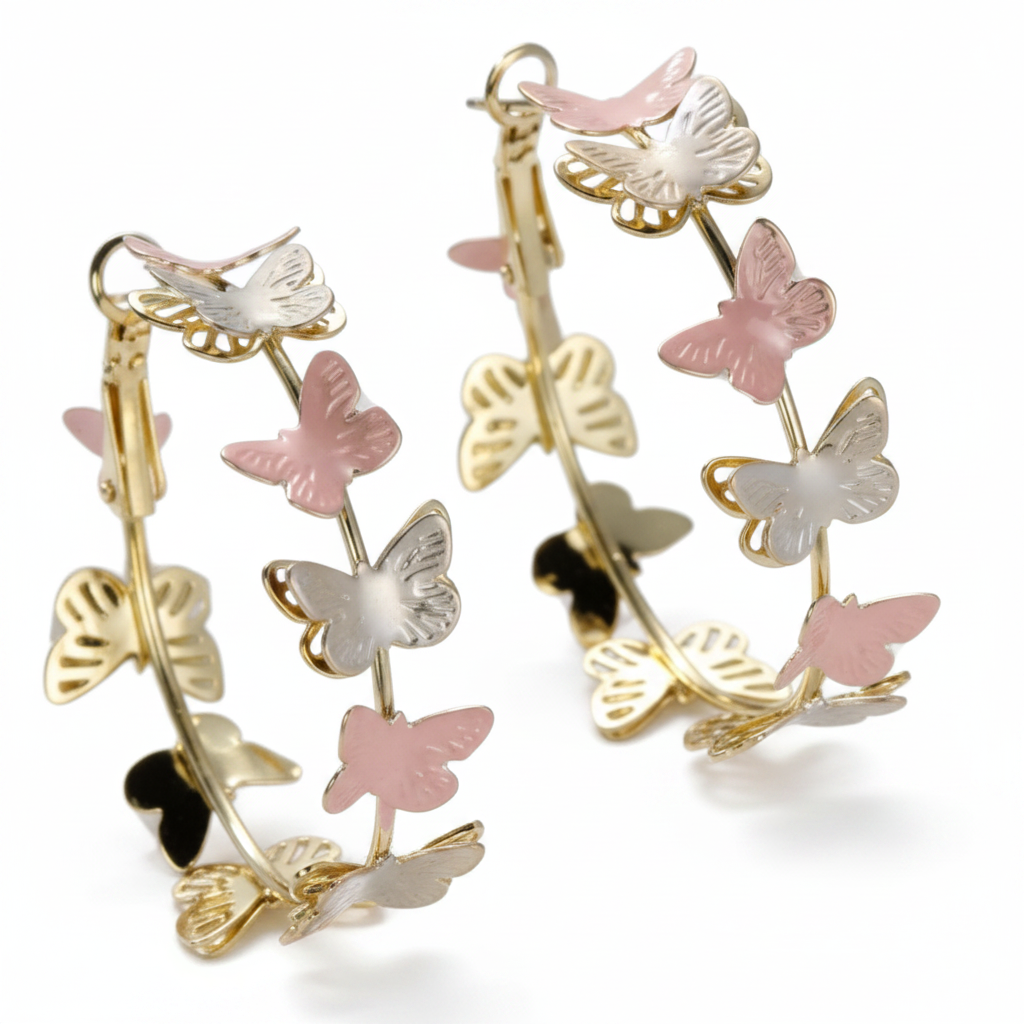 Large hoop earrings with flat butterfly silhouettes in pink silver and gold threaded on hoop wire on white background