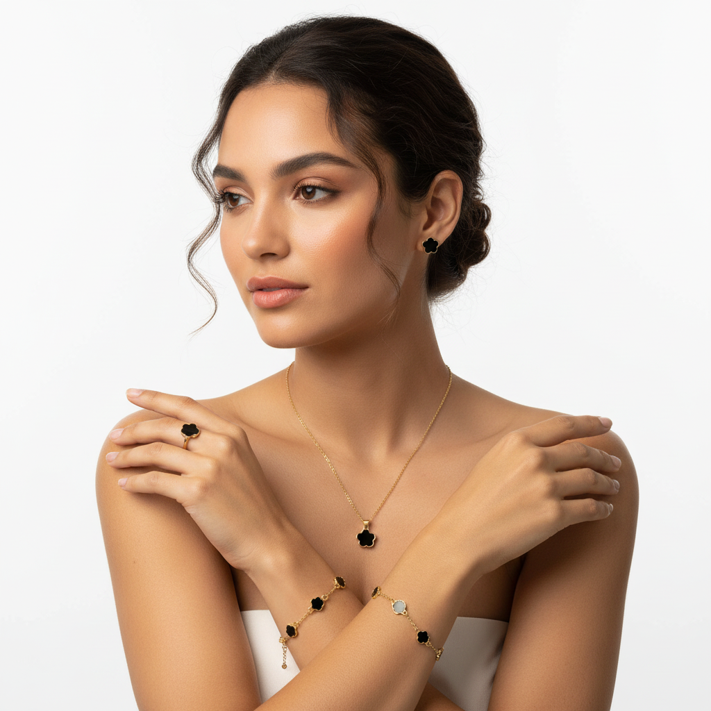 Woman wearing black five-petal flower gold jewelry set