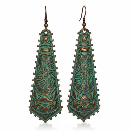 Long tapered teal-green copper dragonfly earrings on white background