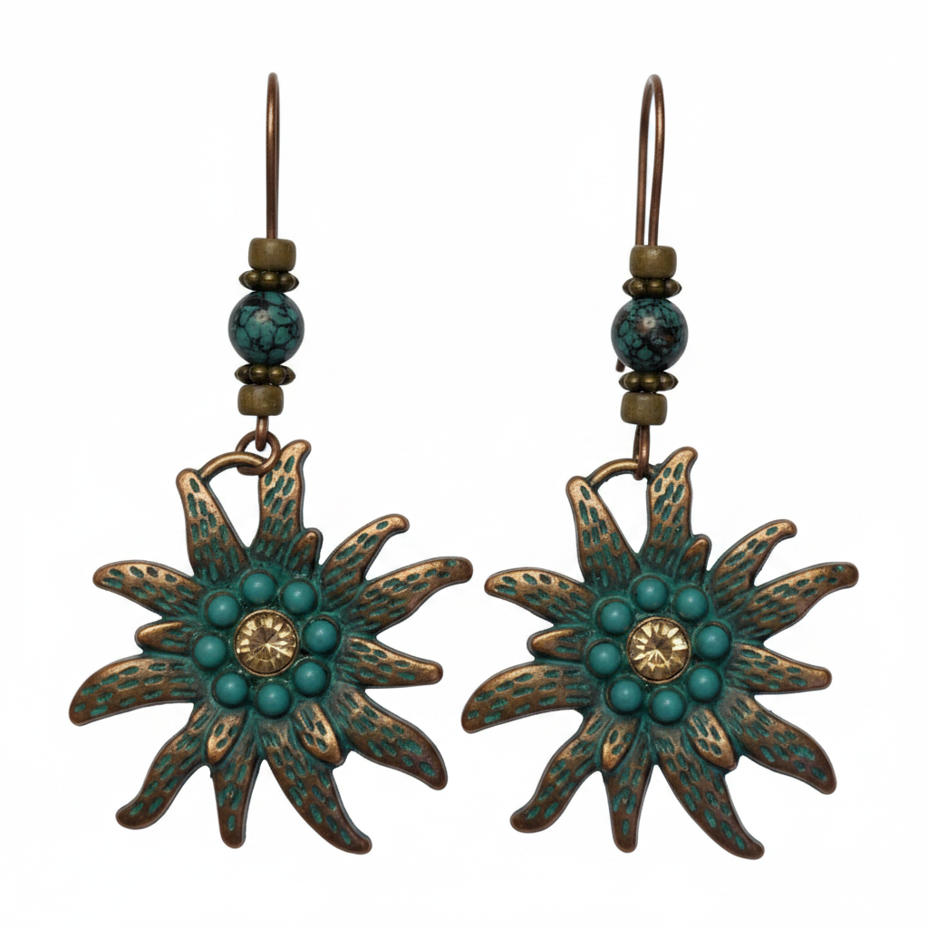Antique bronze sun earrings with teal accents on white background