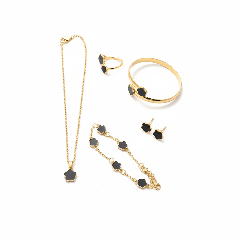 5-piece black clover gold jewelry set on white background