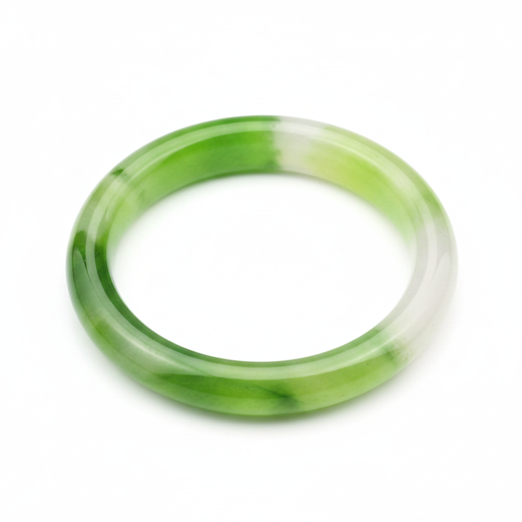 Vibrant translucent jade green bangle bracelet on white background